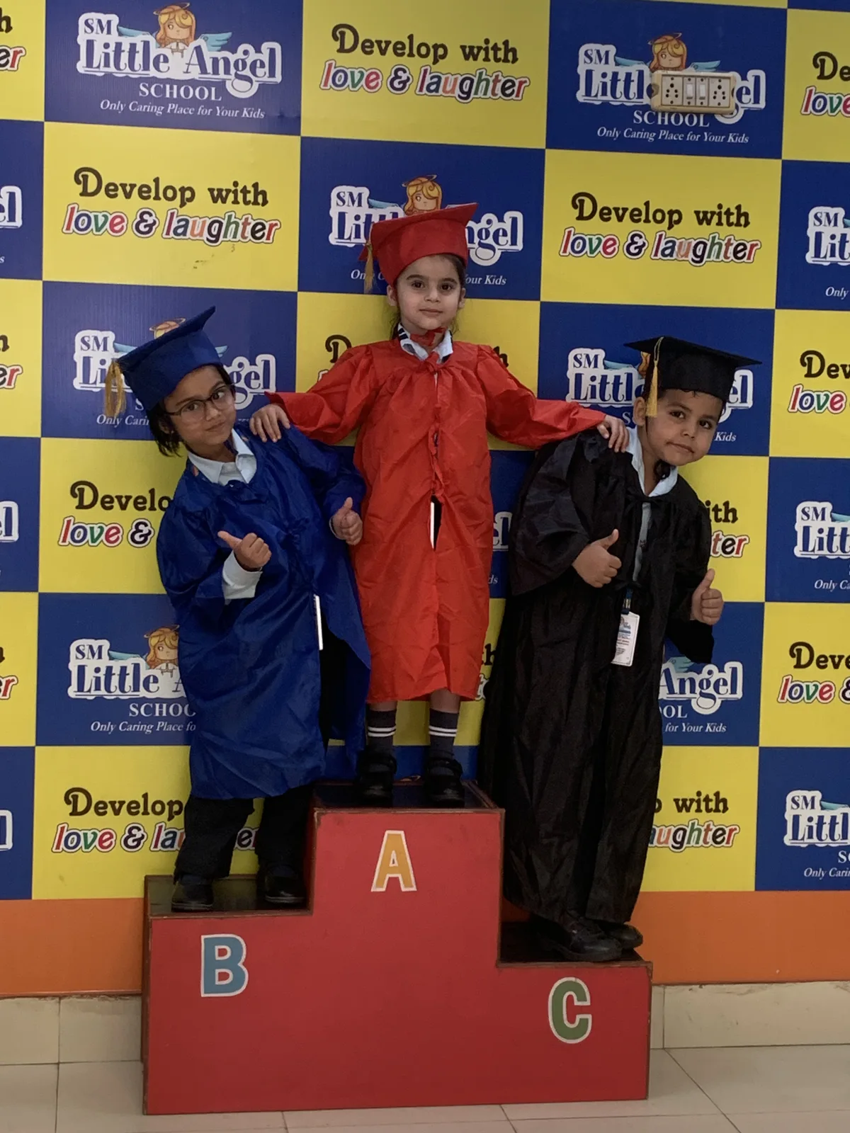 Children celebrating Graduation Day at SM Little Angel School